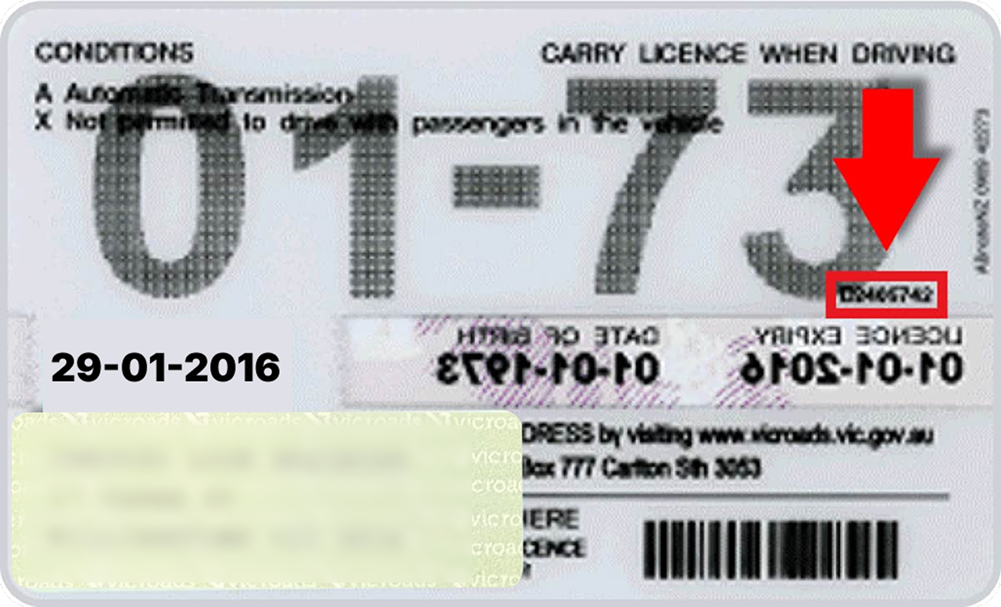 Card showing card number beneath the birth year on the back
